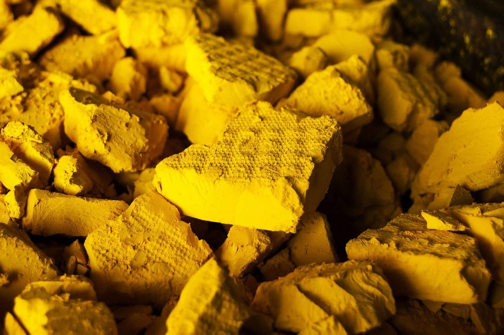 Žlutý uranový prášek; Zdroj: NRC